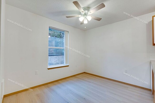 Building Photo - Spacious Pet-Friendly Ground Level Unit w/...