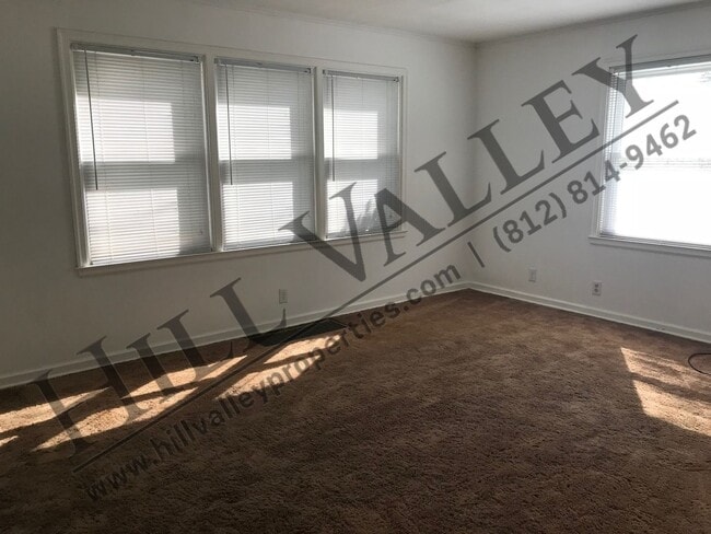 Building Photo - Three bedroom, 1 1/2 bath - East