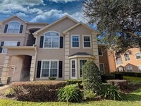 Building Photo - Great 2 Bedroom, 2 Bathroom Second Floor Unit Located inside a Gated Community with a One Car Gar...