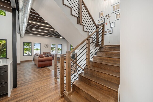 main level stairs - 26539 E Shore Pl