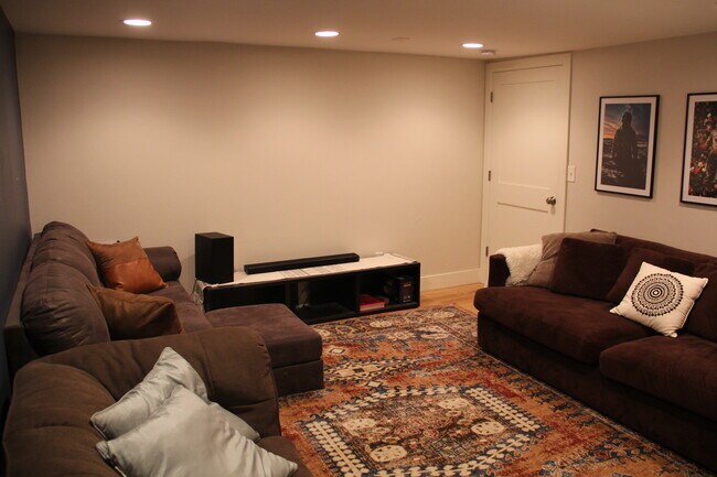 Movie Room Set-Up with Pull out couch - 932 S Holly St