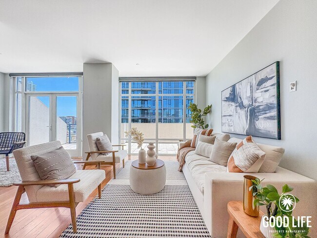 Building Photo - Luminous 2BD/2BA Apartment in East Village with Reserved Parking, City Views & Rooftop Amenities