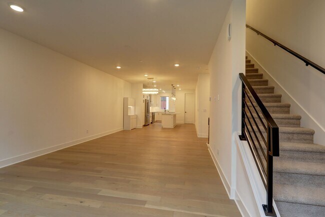 Building Photo - Live Where Style Meets Convenience – 2BR Townhome + Garage