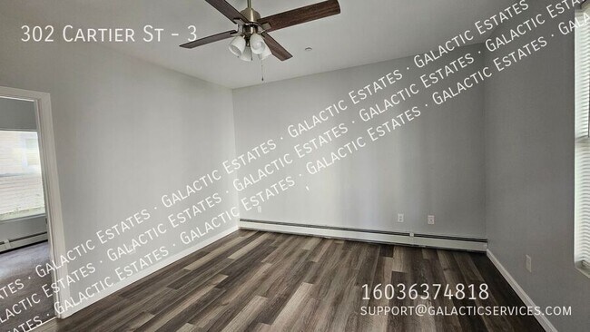Building Photo - 302 Cartier St