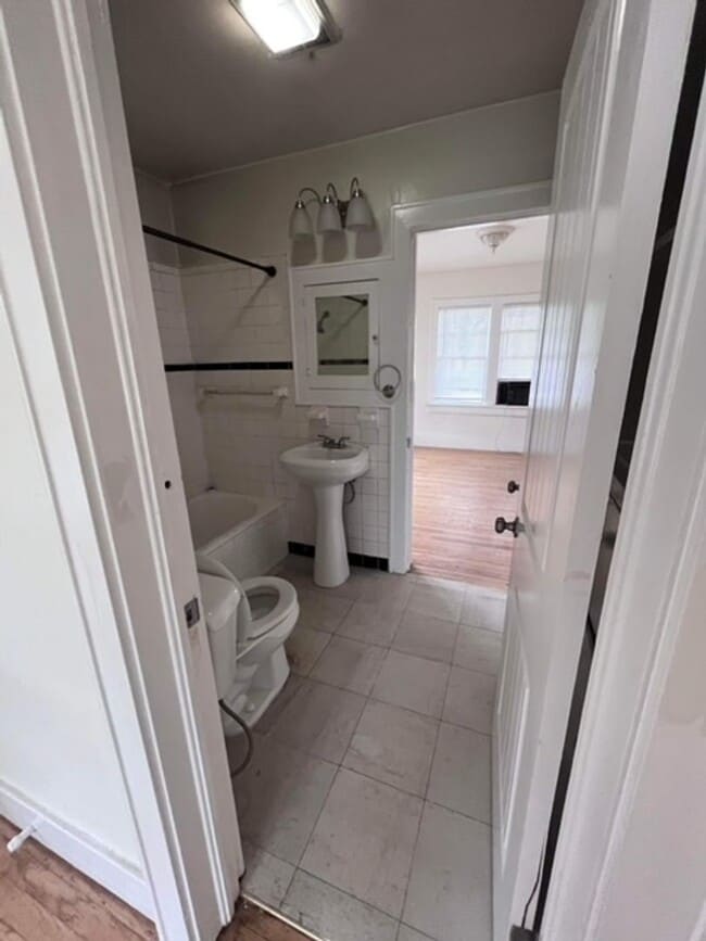 Building Photo - Super Charming - Wood Floors Throughout
