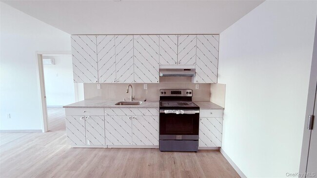 Building Photo - 70-09 45th Ave