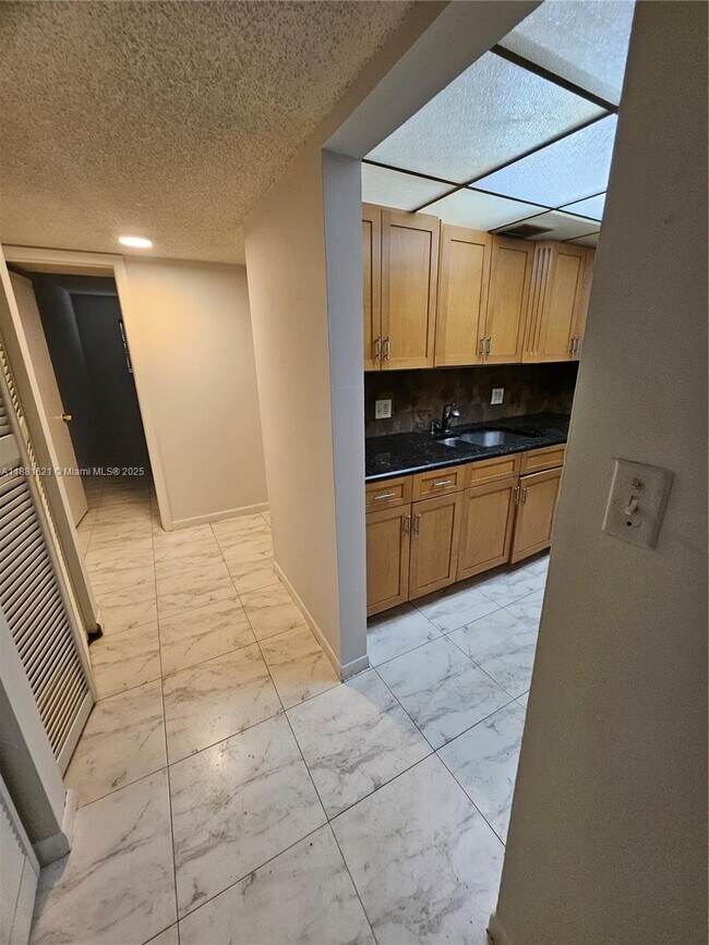 Building Photo - 11131 Royal Palm Blvd