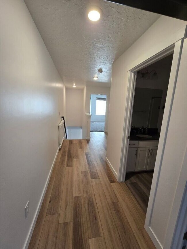 Building Photo - Nearly New, Well Appointed Modern Townhouse w 2 car attached garage