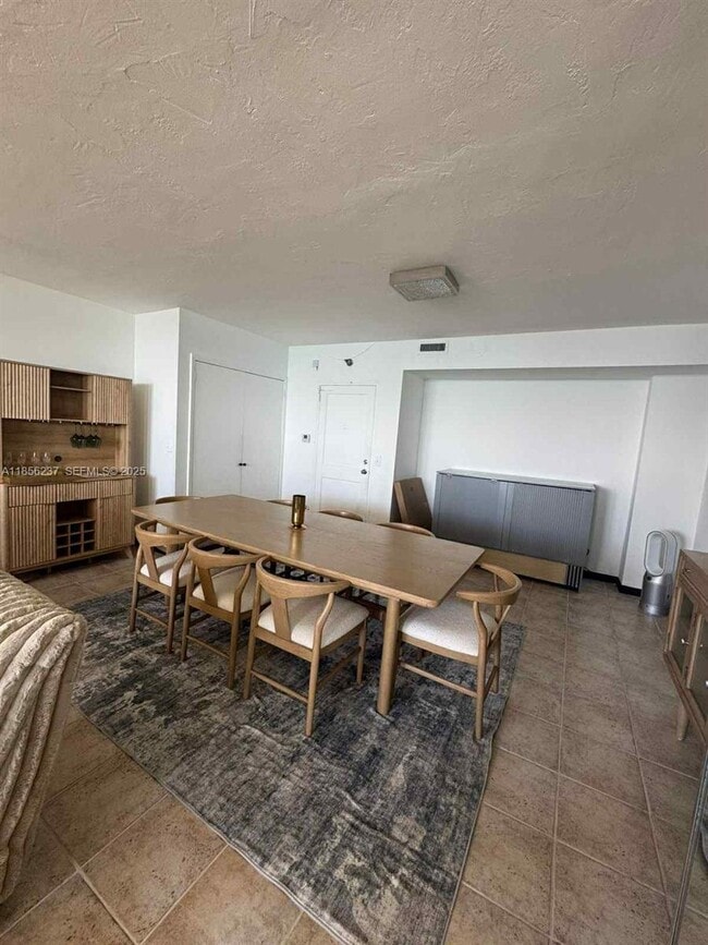 Building Photo - 10185 Collins Ave