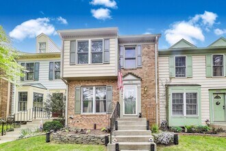 Building Photo - COMINGS SOON - Beautifully Updated Winchester-Built Townhome Backing to Serene Parkland.