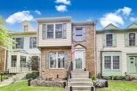 Building Photo - COMINGS SOON - Beautifully Updated Winchester-Built Townhome Backing to Serene Parkland.