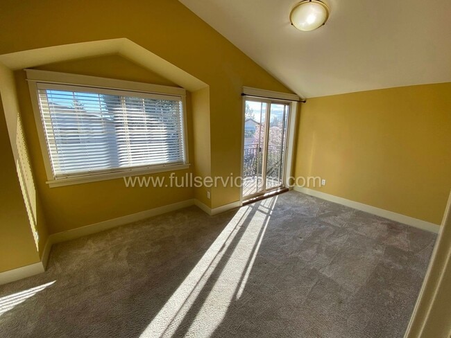 Building Photo - Spacious townhome with private backyard, garage parking, multiple decks, and a dedicated home off...