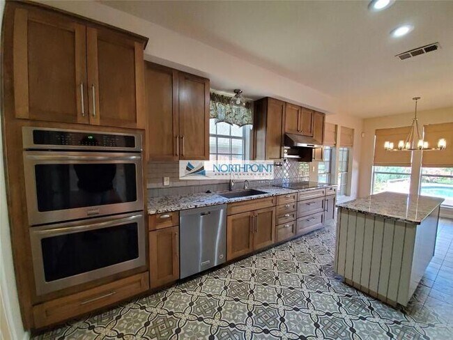 Building Photo - Stunning corner lot home with beautiful pool and upgrades throughout.