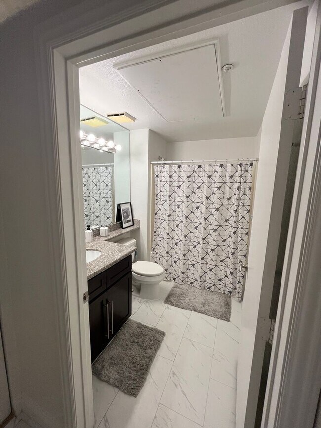 Building Photo - Meridian  Fully FURNISHED Condo with Strip...