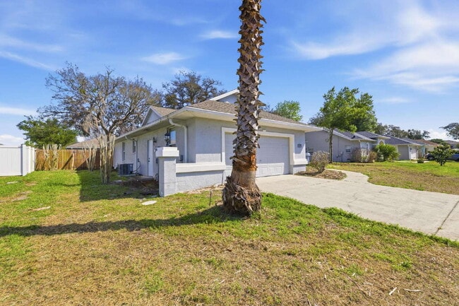 Building Photo - Spacious 3BR/2BA pet friendly home with a fenced backyard and oversized patio