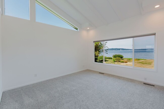 Building Photo - Low Bank Waterfront New Remodel on Huge Lot