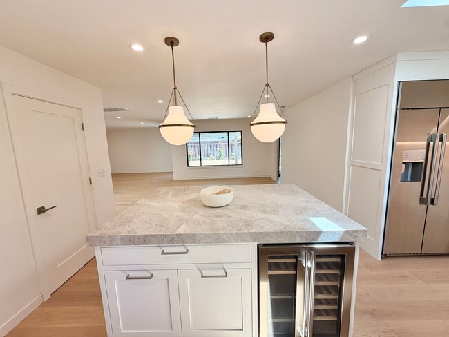 Building Photo - This premier 4-bed, 3-bath estate spans 2,565 sq. ft. on a 10,253 sq. ft. lot in North Los Altos.
