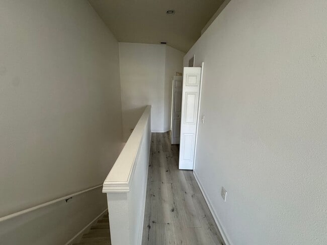 Building Photo - Lake Views. Upgraded Finishes. Gated Commu...