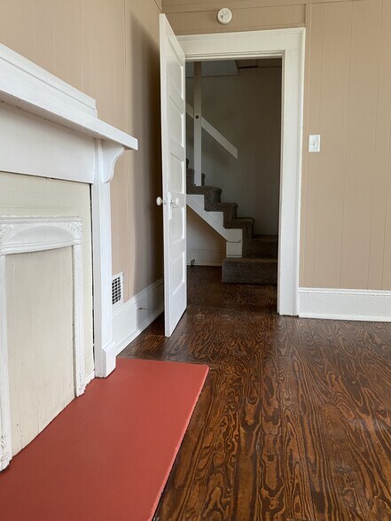 Living Room with stairs to Loft - 222 W End Blvd