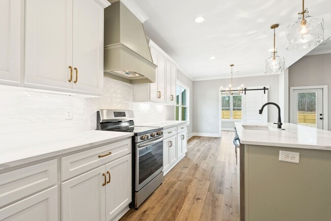 Building Photo - Available now! New Spacious 3 br 2.5 Ba with private 2 car garage, covered patio and fenced in ba...