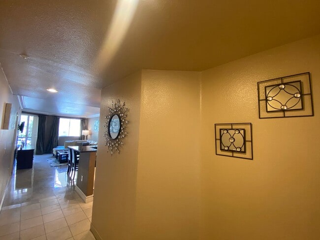 Building Photo - Fully furnished 2 bedroom unit in 24/7 guard gated community