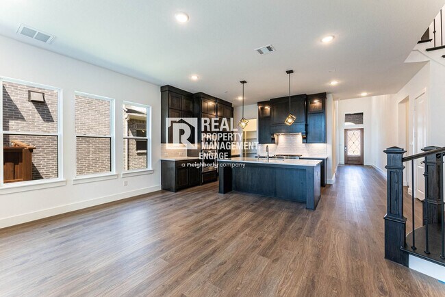 Building Photo - Highly Upgraded Five-Bedroom Home Located ...