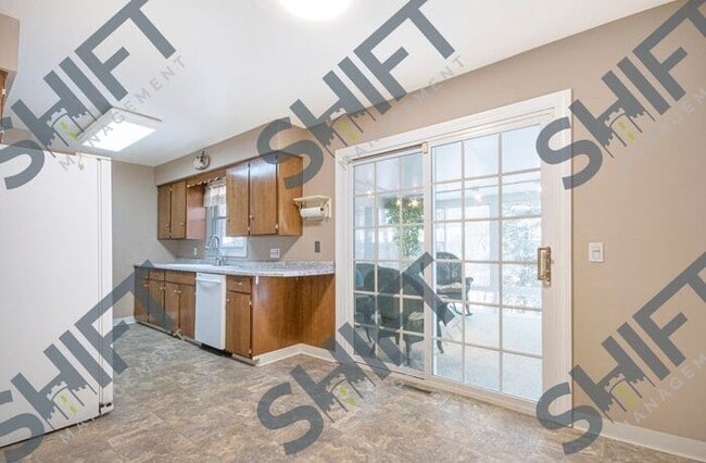 Building Photo - 5671 Christie Ave - Gorgeous 4 Bed