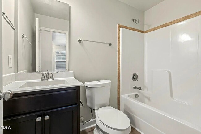 Building Photo - Earn Wealth While Leasing - Like a Homeown...