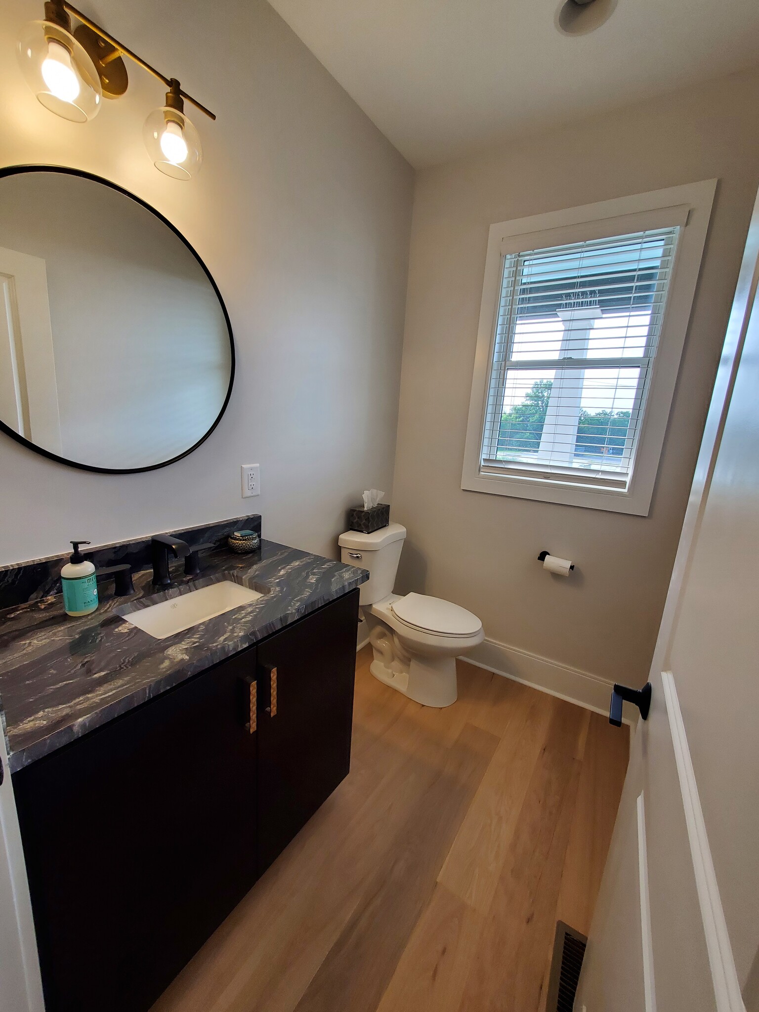 Spacious half-bath on the first floor. - 1021 Cheatham Pl