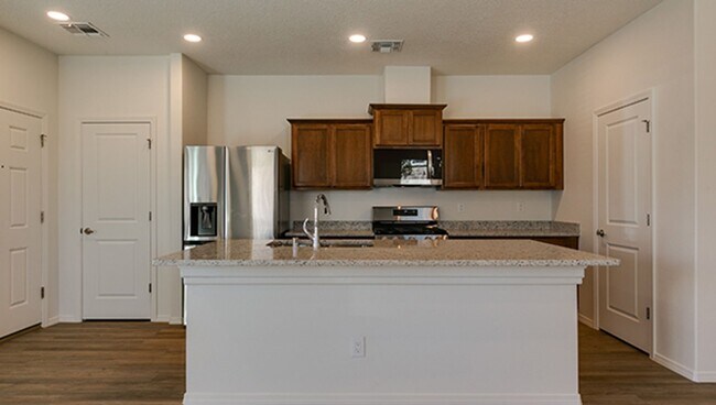 Building Photo - New ST FE Town Home