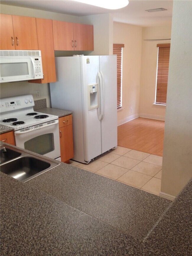 Building Photo - 10025 SW 24th Ct