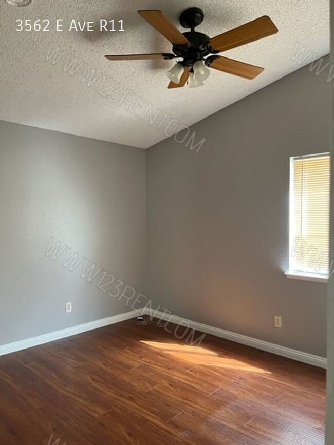 Building Photo - 3562 E Ave R-11