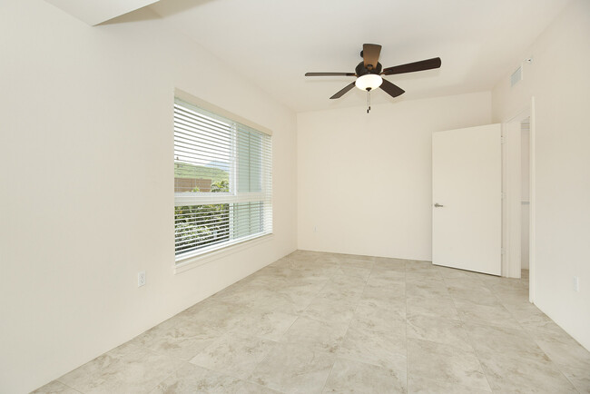 Bedroom facing entry door - 497 Kailua Rd