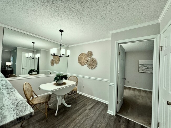 Building Photo - REDUCED PRICE! Updated 1st Floor/1-Level Condo Ready NOW! Includes Water, Sewer, Trash, Landscapi...