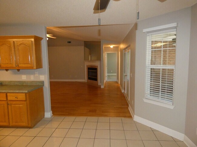 Building Photo - Charming 4-Bedroom Home With Sunroom