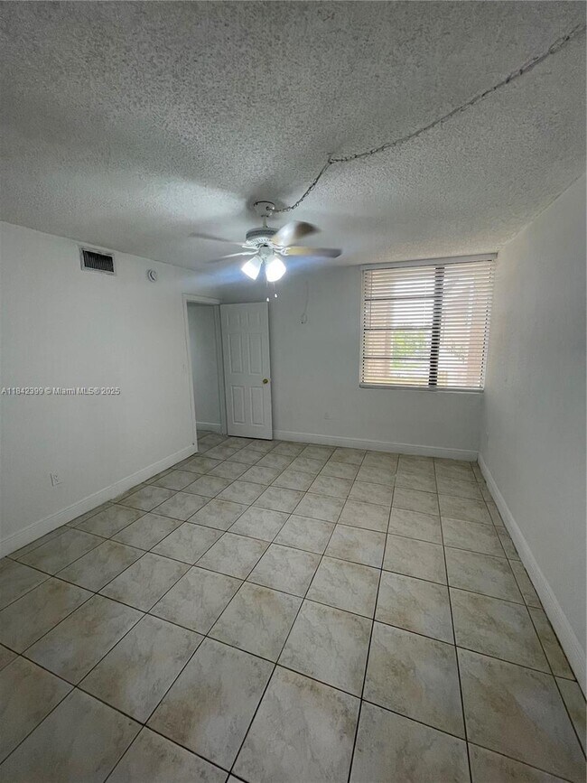 Building Photo - 10500 SW 108th Ave
