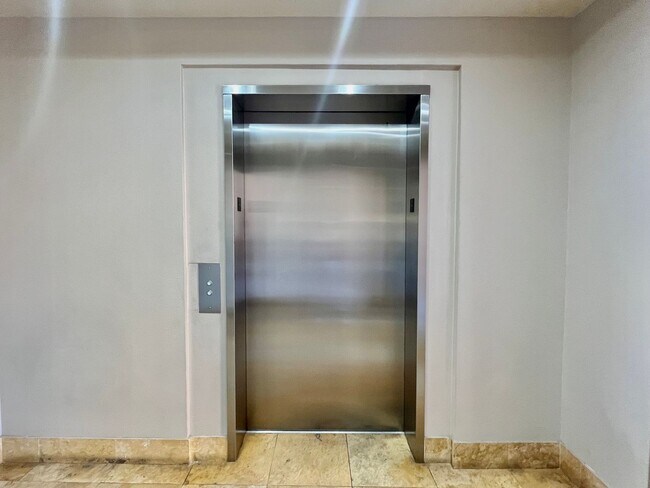 Building Photo - Spacious 2 Bedroom High-Rise Condo with Resort-Style Amenities & Oversized Balcony