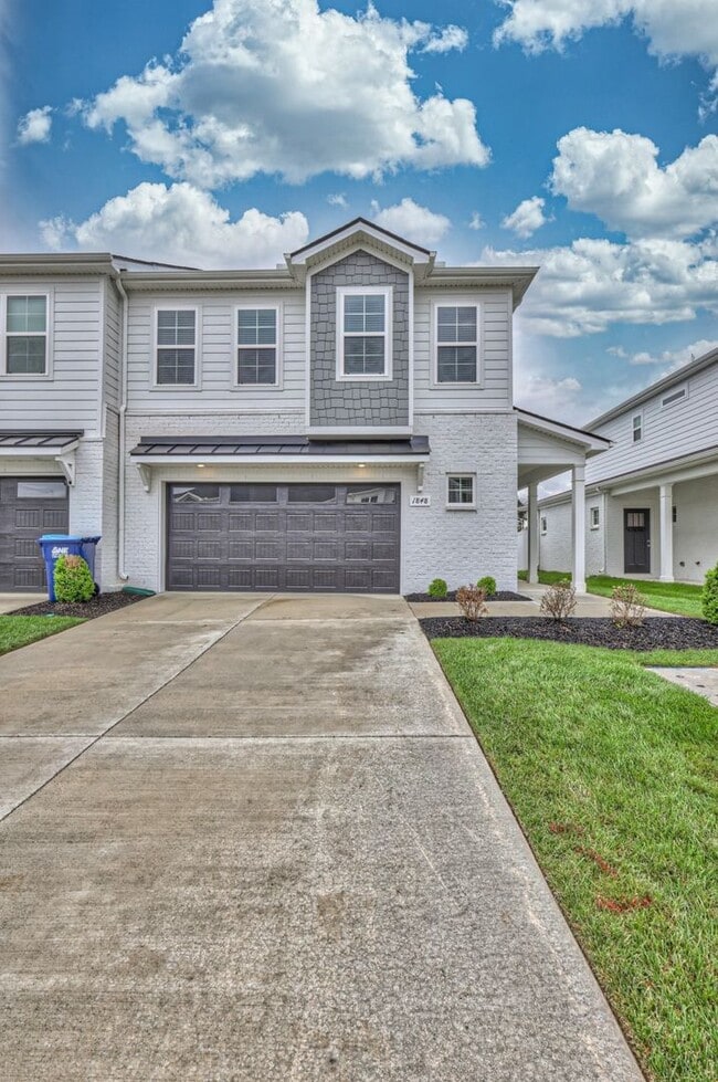 Building Photo - Brand New Luxury Townhome! 3 BR, 2.5 BA, 2 Car Garage, Pool, Dog Park, and More!