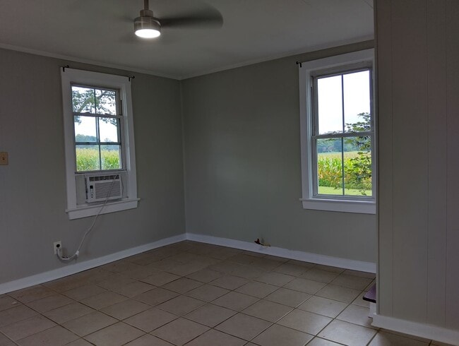 Building Photo - Adorable farmhouse ready for new long term...