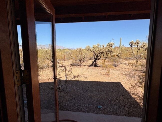 Building Photo - Desert Home on 3.3 Acres with Rooftop Views & Unique Rammed Earth Design