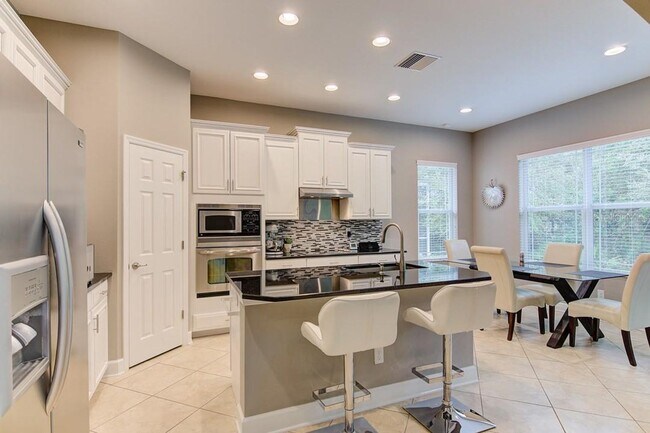 Building Photo - 4/3 Stylish and Spacious 2-story home with...