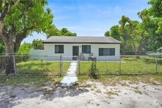 Building Photo - 10424 NW 33rd Ave