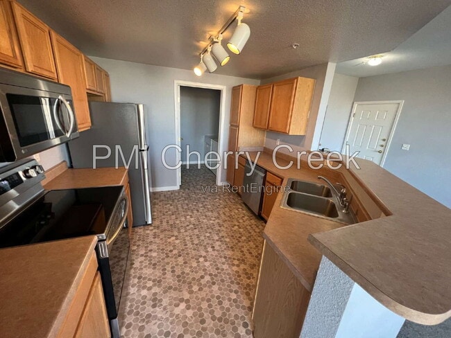 Building Photo - 5705 N Genoa Way