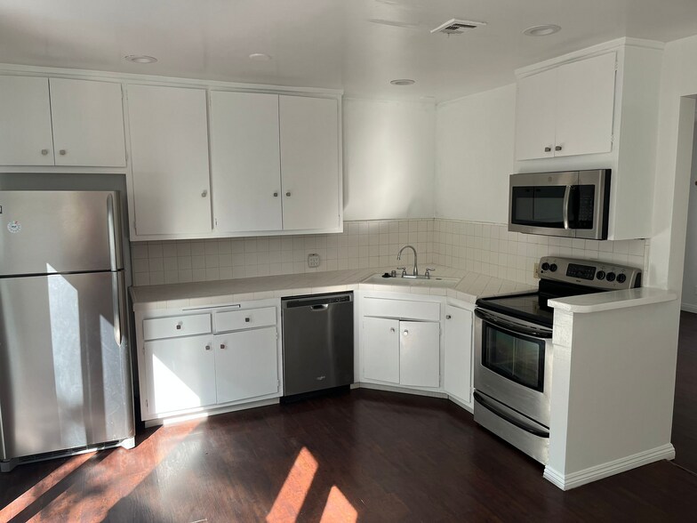 Kitchen with Stainless Appliances - 8315 W Manchester Ave
