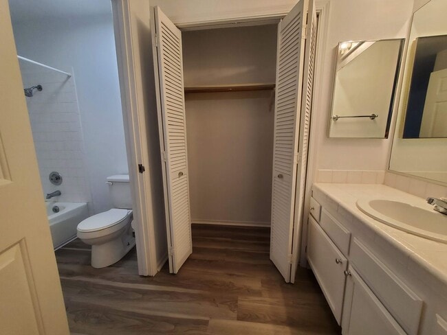 Building Photo - Update 2x2 Top Floor Condo with pool, storage, fireplace & garage in ideal Novato Location
