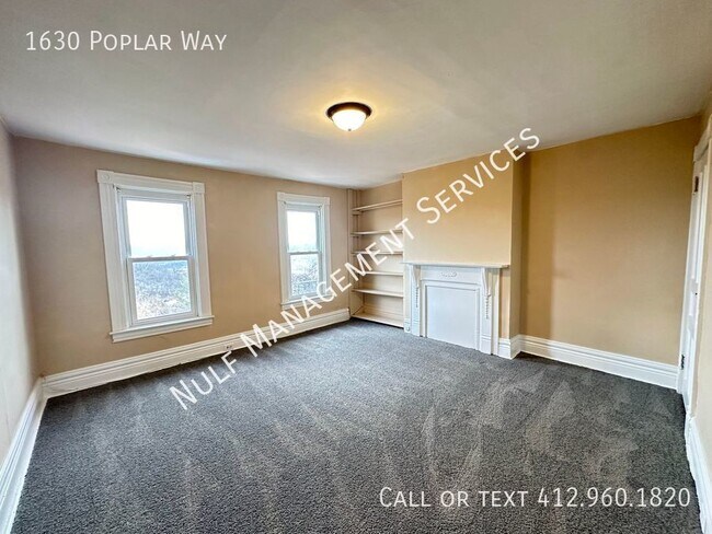 Building Photo - 1630 Poplar Ave