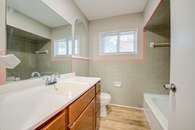Building Photo - Charming Mid-Century Home with Basement and Fenced Backyard!