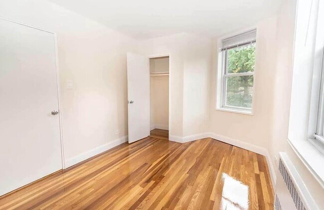 Building Photo - 55-05 Woodside Ave