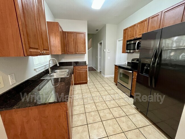 Building Photo - 8202 Downpatrick Ct