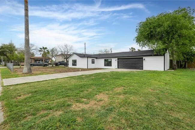 This house is on a large piece of land. - 5401 Burton Ln